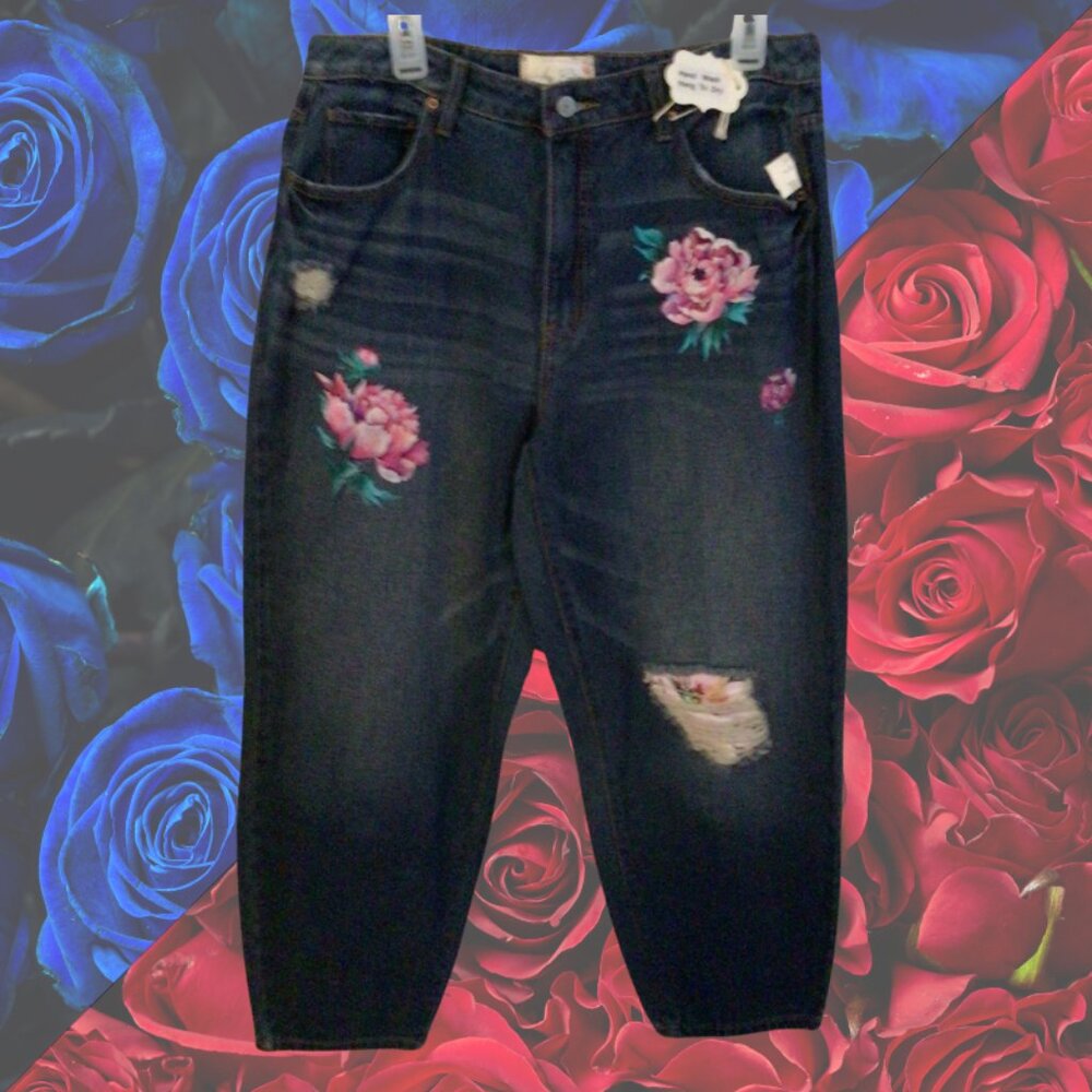 Size 14 Jean pants Waist is 17 inches across. Length is 35.5 inches.